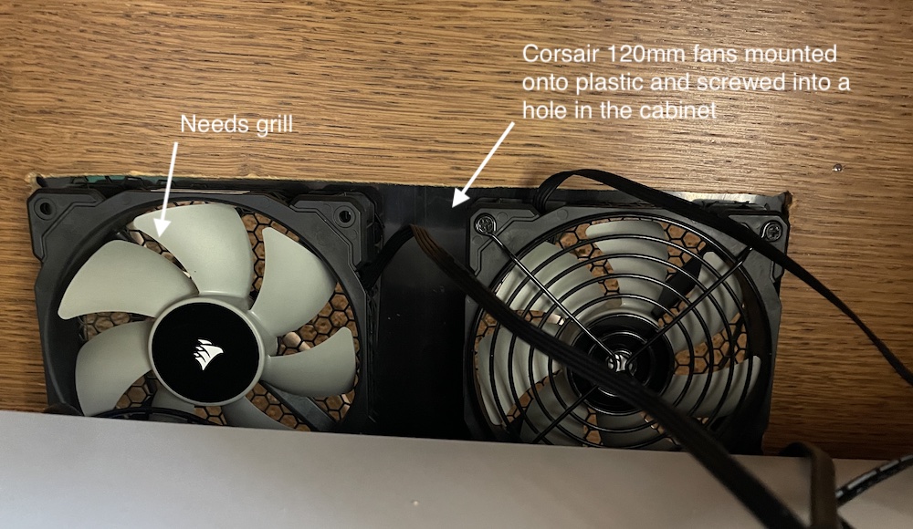120mm fans fitted in the media cabinet drawing air through the enclosure