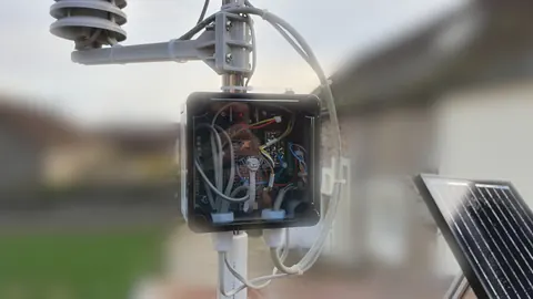Interior of the sensor enclosure showing the ESP32 Pico Kit and daughter boards.