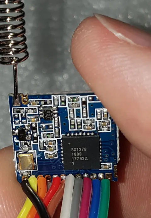 A LoRa module with antenna and SPI wiring attached — ESP32 communicates with the LoRa radio chip over this same SPI interface.