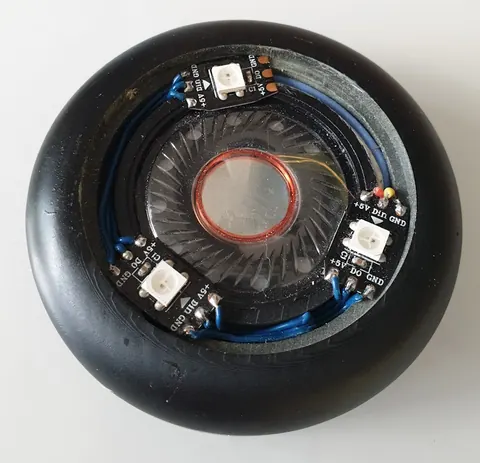VoicePuck assembled and viewed from the top, showing the clean puck form factor