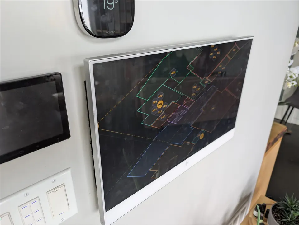 PadSpan running on a wall-mounted panel in daily use, showing the multi-floor live map