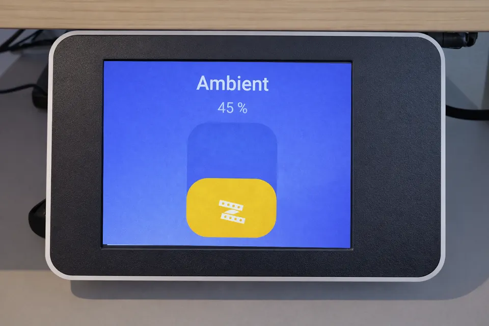 Long-press overlay showing the brightness slider control layer