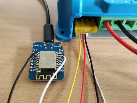 Breadboard circuit showing VE.Direct JST-PH cable connected to an ESP module